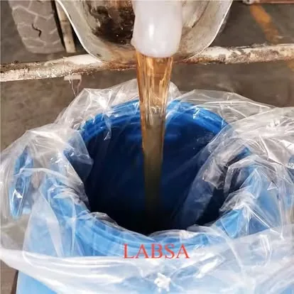 LABSA being decanted into a lined drum